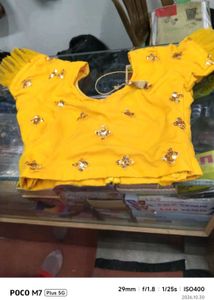Stunning Yellow Sequined Lehenga Choli