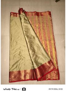 Elegant Golden Saree with Red Border