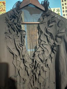 Women's Black Ruffle Front Top