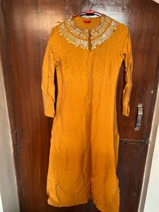 Elegant Yellow Kurta with Embellished Neckline