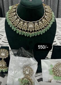 necklace with jhumka earring and tika