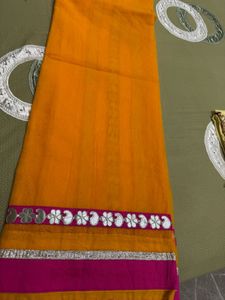 beautiful yellow saree with pink border