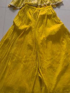 Stunning Yellow Sequined Lehenga Choli