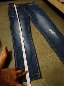 Distressed Blue Denim Jeans