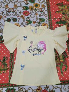 Brand new Yellow Graphic Top