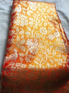 Beautiful parrot theme Brocade orange silk