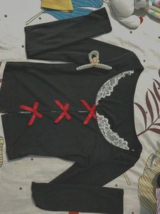 Chic Black Long Sleeve Top with Red Bows