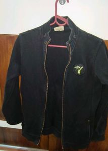 Classic Black Zip-Up Jacket with Unique Patch