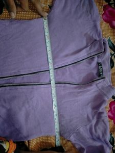 A Fitted Crop Top With Zip That Looks Super Cool