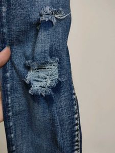 Distressed Blue Denim Jeans