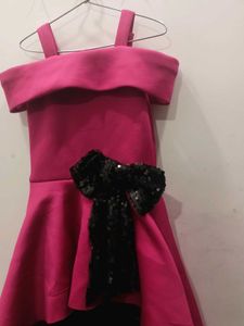 Stunning Fuchsia Gown with Black Sequin Bow