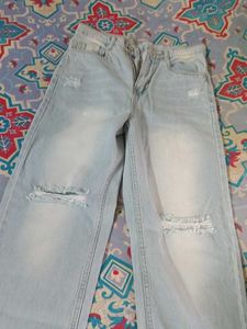 Light Wash Ripped Wide Leg Jeans.