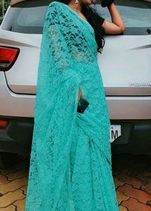 Stunning Teal Lace Saree with Pearl Embellishments