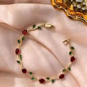 Elegant Ruby & Emerald Leaf Bracelet