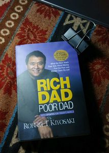 Rich Dad Poor by Robert T. Kiyos
