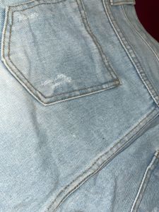 Light Wash Ripped Denim Skirt