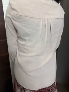 Elegant Ruffled Cream Blouse