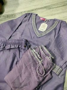 Elegant Lavender Kurta Set with Embellished Neckli