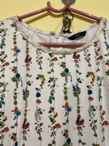 Chic White Floral Jumpsuit with Overlay