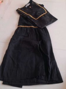 like New  Elegant Black Kurta Set with Gold Trim
