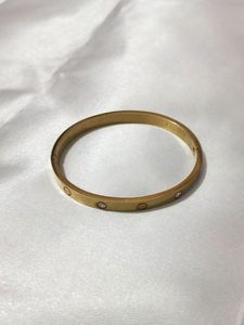 Golden Handcuffs With Ad Stone