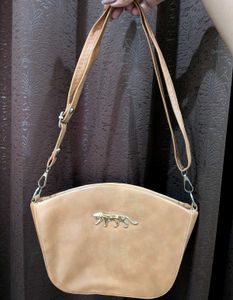 Chic Tan Shoulder Bag with Tiger Emblem