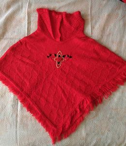 Red Knit Poncho with Tassel Fringe