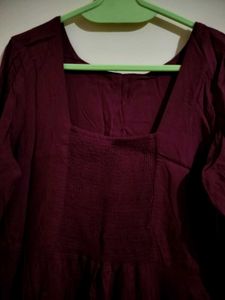 wine red/maroon frock with a slit bell sleeves
