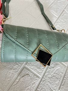 Green Roll shaped sling bag