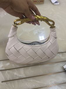 Chic Woven Handbag with Gold Handle