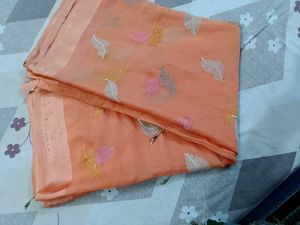 Beautiful Orange Saree with Feather Motifs