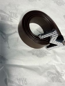 Stylish Brown Belt with Geometric Buckle