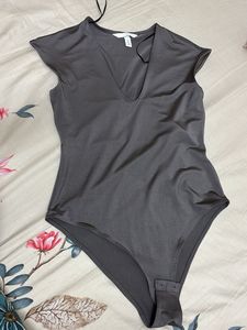 Sleek V-Neck Cap Sleeve Bodysuit