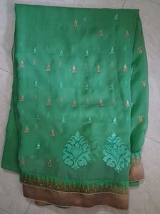 Elegant Green Saree with Golden Border