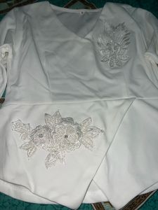 White Embroidered Peplum Blouse