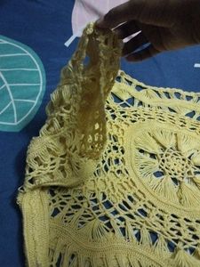 It is a yellow shrug.