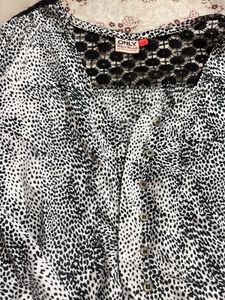 Stylish Black & White Print Top with Lace Detail