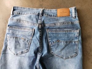 Classic Light Wash blue Denim Jeans and black deni