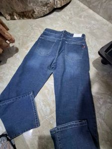 Distressed Blue Flare Jeans