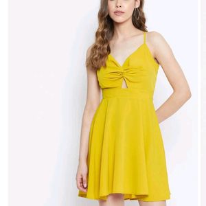 Today's Offer ₹150 Berrylush Women Solid Yellow Front Twist Knot Fit &amp; Flare Mini Dress For Women (Mustard Colour)