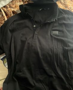 A Black T-shirt ( Not Even Wore Once)
