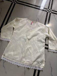 NewElegant Cream Kurta with Lace Trim