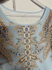 sky blue Chinese attire
