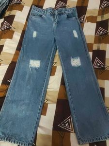 Distressed Blue Denim Jeans