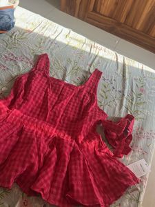 Chic Pink Gingham Peplum Top