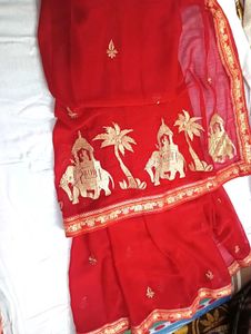 Vibrant Red Saree with Golden Elephant Motif