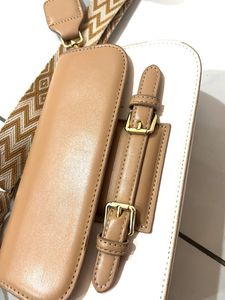 Stylish Crossbody Bag with Geometric Strap