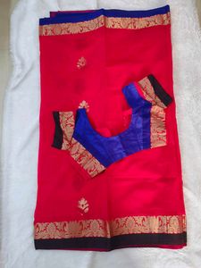 Beautiful Rani pink Saree with Blue Blouse
