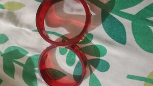 Red Bangles with Gold Floral Embellishments