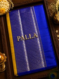 Vibrant Yellow Mashru Silk Saree with Blue Border
